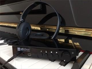 Sistema Adsilent per pianoforte a coda con seconda barra scappamento